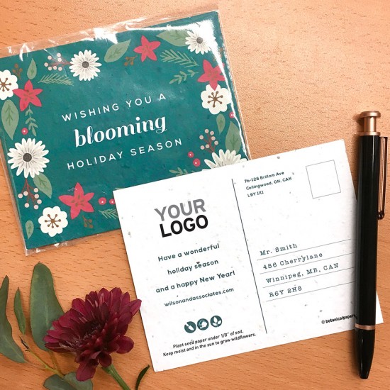 Bursting with beautiful blooms, pine, and leaves, these gorgeous plantable holiday postcards for businesses give recipients the chance to grow a real garden of flowers since they are embedded with tons of wildflower seeds.