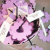 These Bucket of Love Flower Seed Wedding Favors will grow a blend of wildflowers right out of the paper!