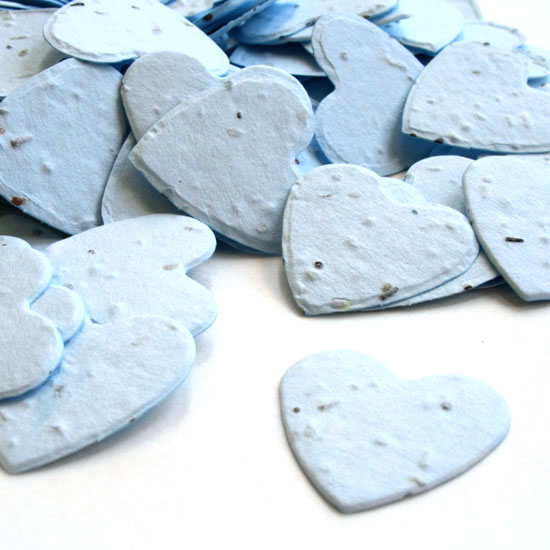 When thrown outside, this heart shaped biodegradable confetti in blue will grow wildflowers.