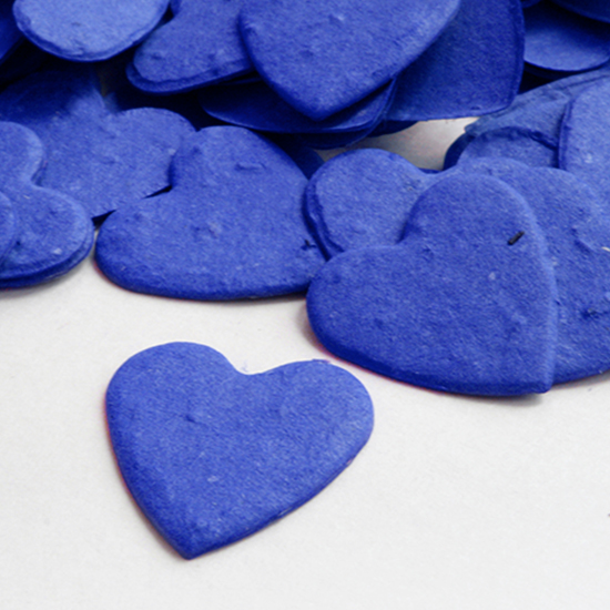When planted, this heart shaped biodegradable confetti in royal blue will grow wildflowers.