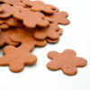 When this d burnt orange biodegradable confetti is thrown outside, it will grow wildflowers.
