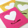 Wildflowers grow right out of the seed paper heart on these Sole Mates Bright Plantable Wedding Favors.