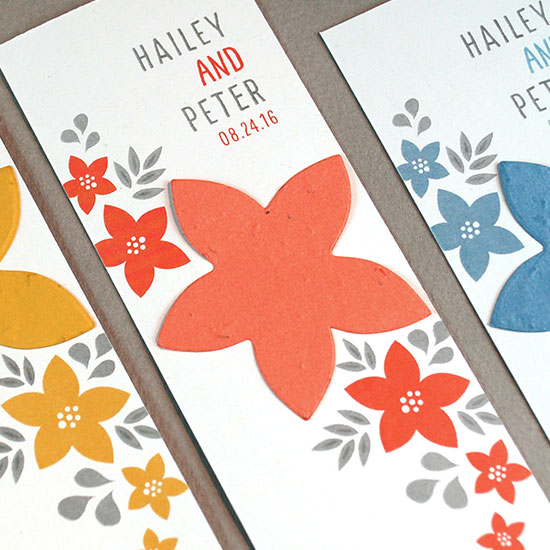 Guests can take these Floral Bookmark Seed Paper Wedding Favors home to plant the seed paper to grow blooming wildflowers.