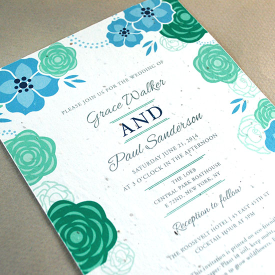 Blooming florals adorn this seed paper wedding invitation that grows REAL flowers!