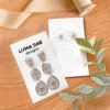Plantable earring cards made with seed paper that grows.