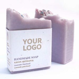 Photo of lavender pachouli handmade promotional soap with a seed paper logo you can add your logo to.