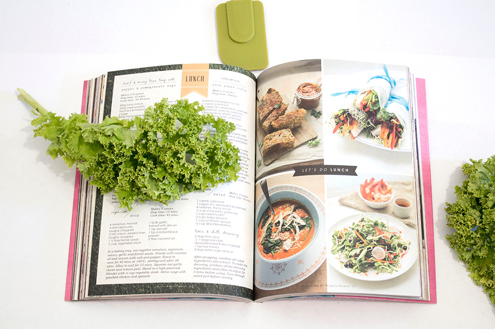 A cookbook with kale and lunch recipes