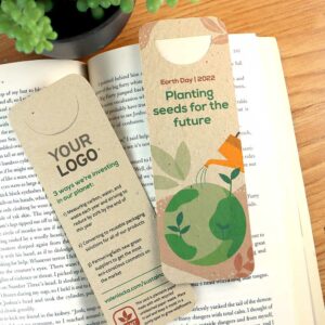 Earth Day themed seed paper bookmark with page slot shown on an open book