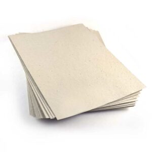 Stack of Eco Natual Seed Paper, a naturally colored, light brown kraft seed paper where the waste paper it’s made with is also recycled unbleached content.