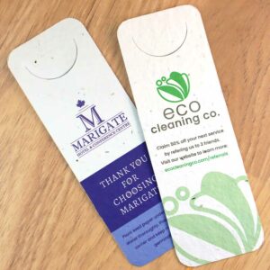 Printed examples of seed paper bookmarks with page slot