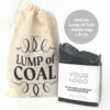 Custom branded activated charcoal handmade soap with a Lump of Coal muslin gift bag