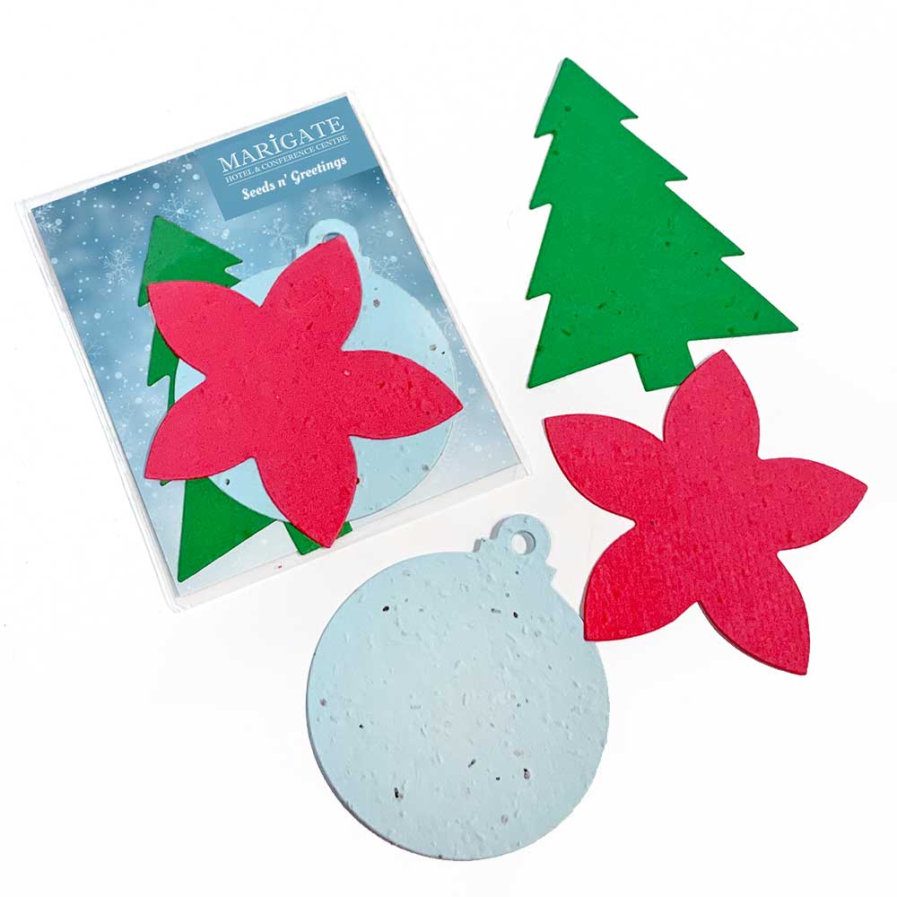 promotional seed paper shape pack that includes 3 festive holiday shape packaged in compostable corn plastic.