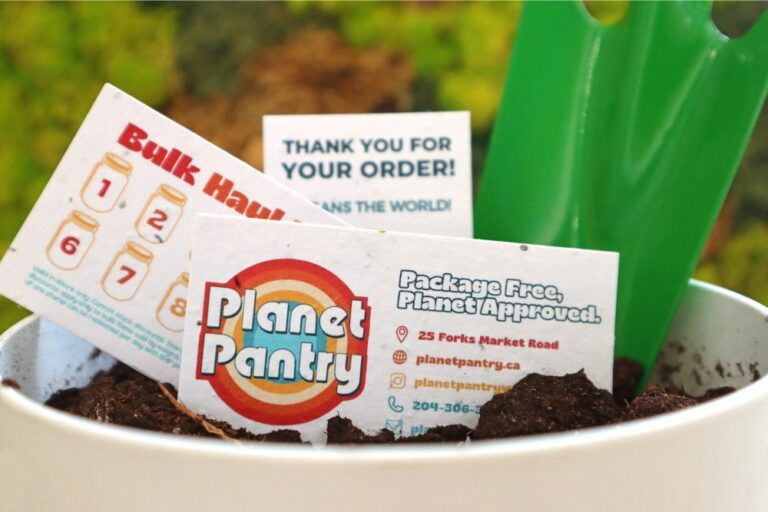 Seed paper customer loyalty stamp cards, business cards, and thank-you cards made by Botanical PaperWorks for client Planet Pantry