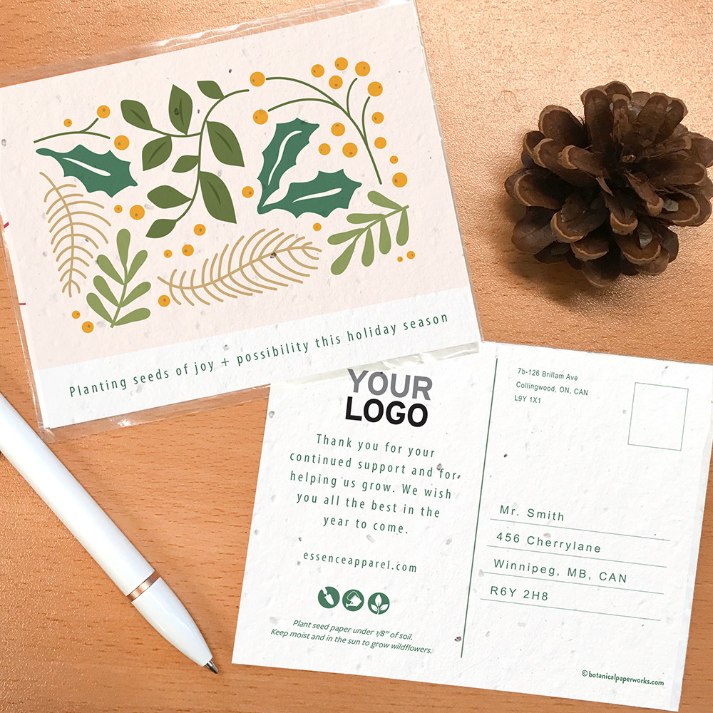 A seed paper holiday postcard with a pretty botanical design