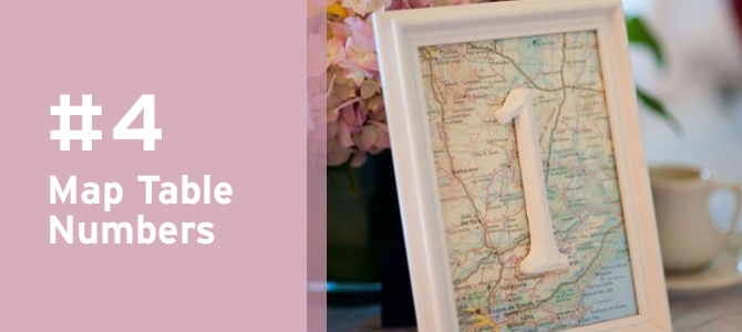#DIY your table numbers with a #map cutout to show off your love of #travel at your #destinationwedding! Find MORE charming details on our latest blog post.