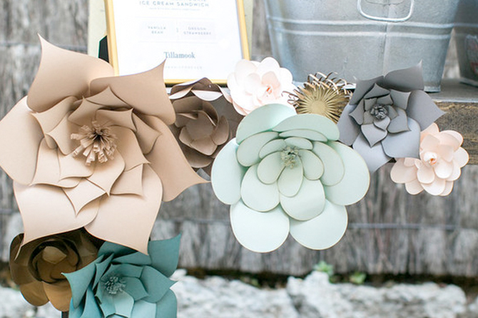 Paper flowers can be used anywhere to add elegance without increasing your budget. See this and other pretty paper crafts!