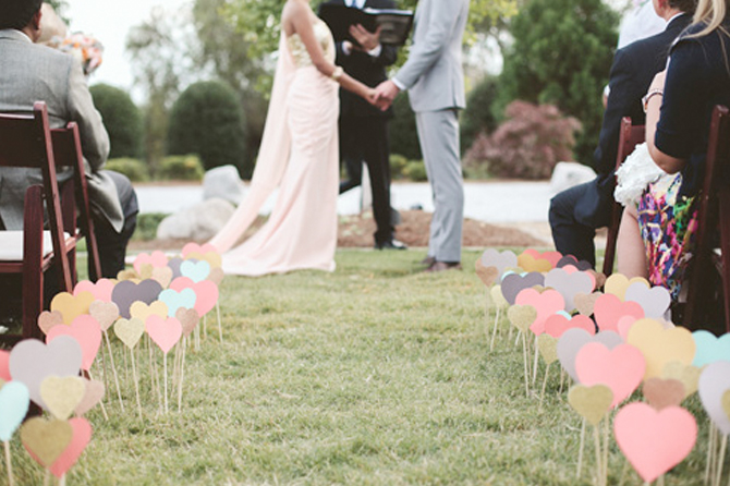 This heart aisle idea and more wedding paper crafts will inspire you to make your own wedding decor.