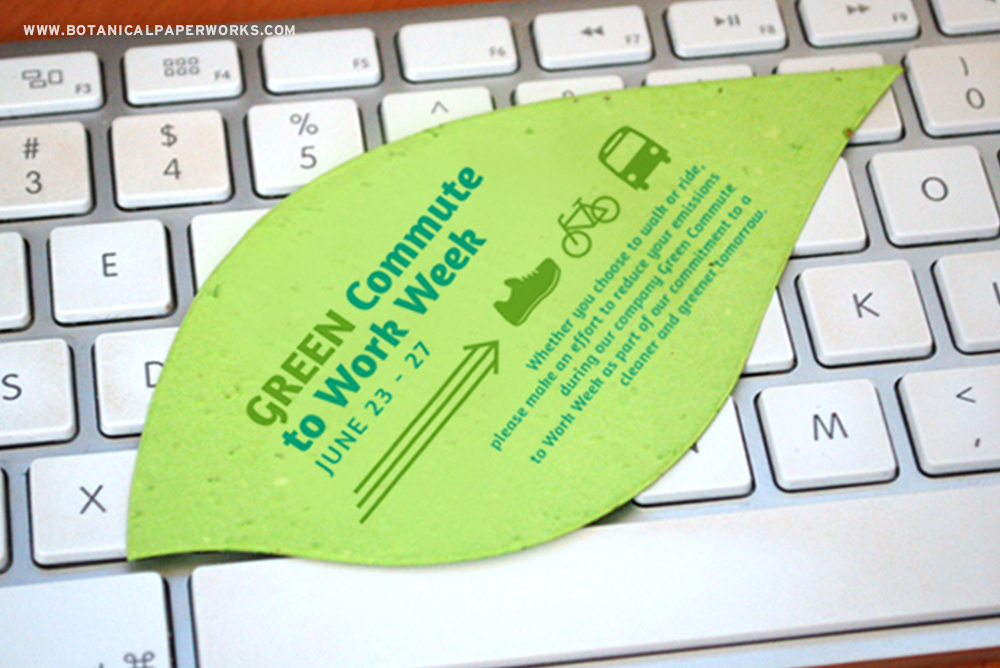 Promote a company initiative by leaving a seed paper shape on employee desks to get their attention.