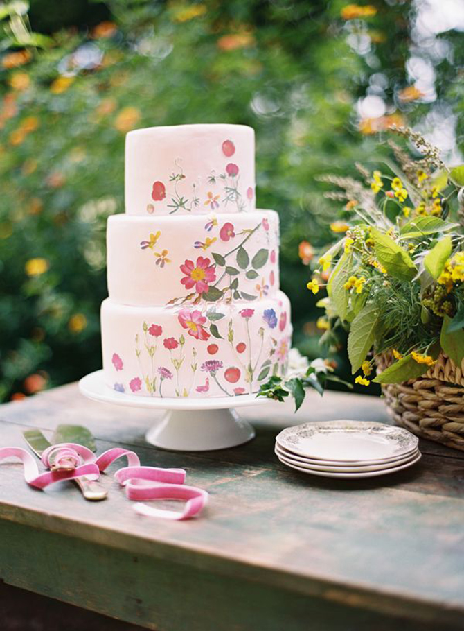 Because extravagantly designed wedding cakes are so trendy right now, a beautiful way to add even more touches of your flower of choice is to have them designed into your cake.