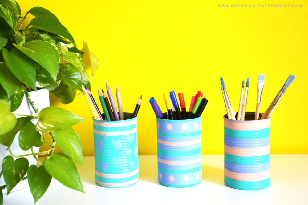 Upcycled tin cans as pencil holders