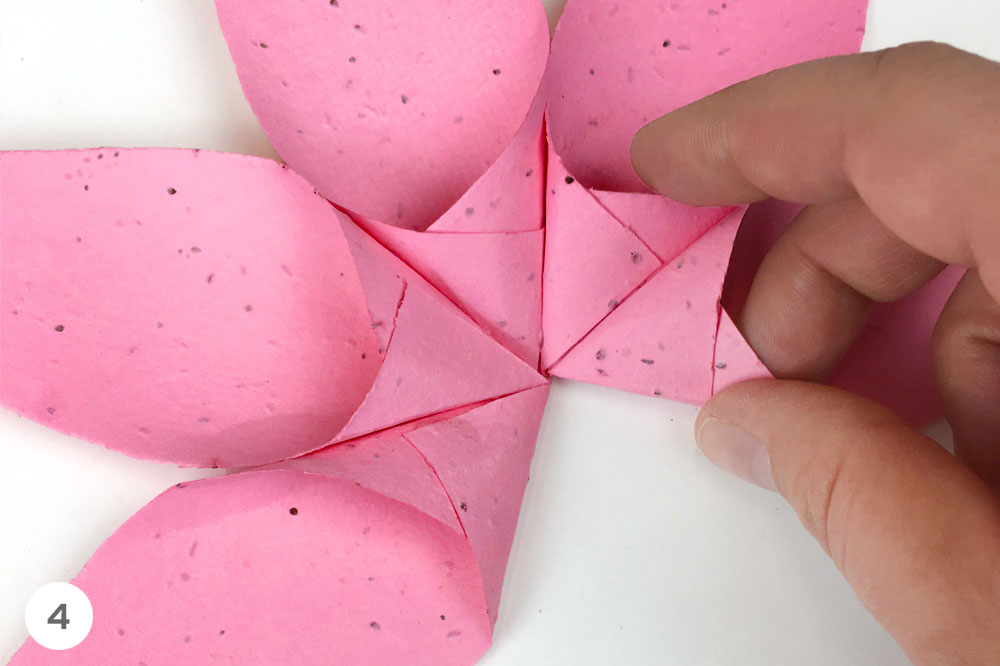 Learn how to make these seed paper flowers for eco-friendly party decorations.